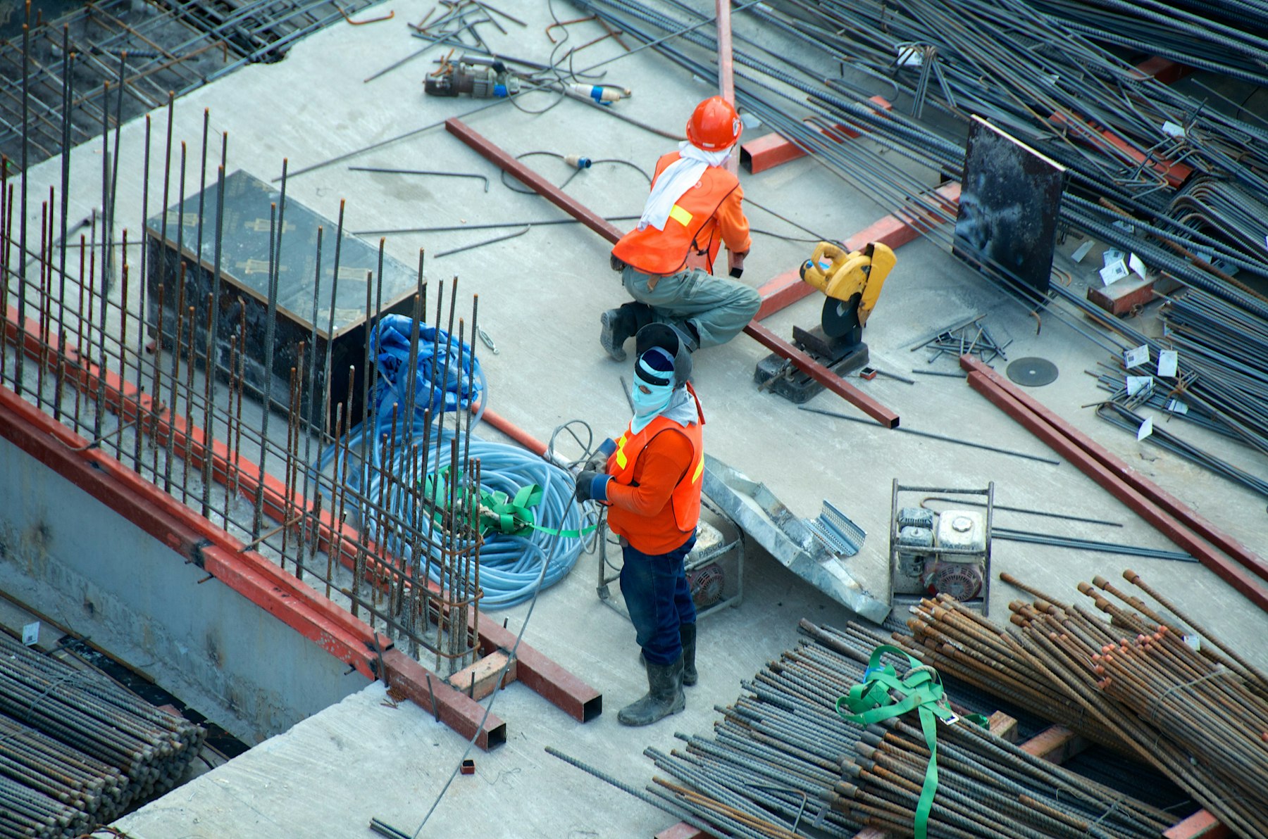 Builders working on a concrete structure