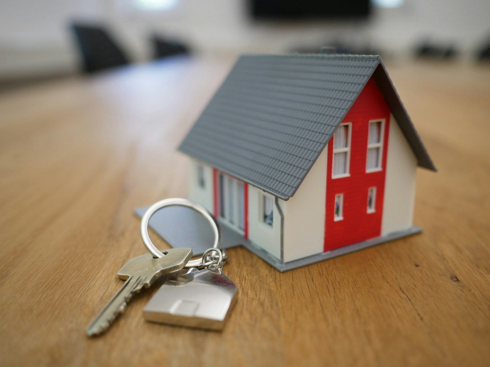 A model house with a set of keys